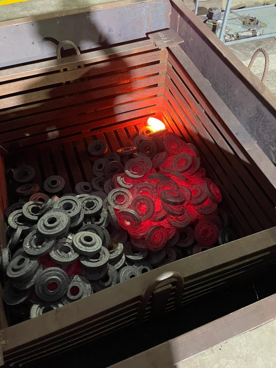 Stacks of finished bearing rings arranged for dimensional verification.