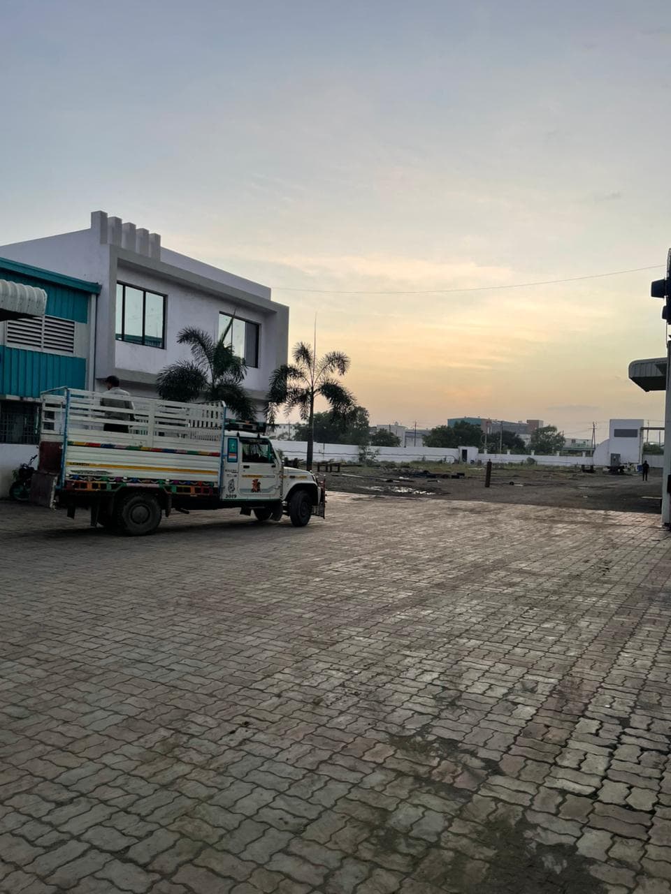 Manufacturing floor with overhead cranes and ring rolling units.
