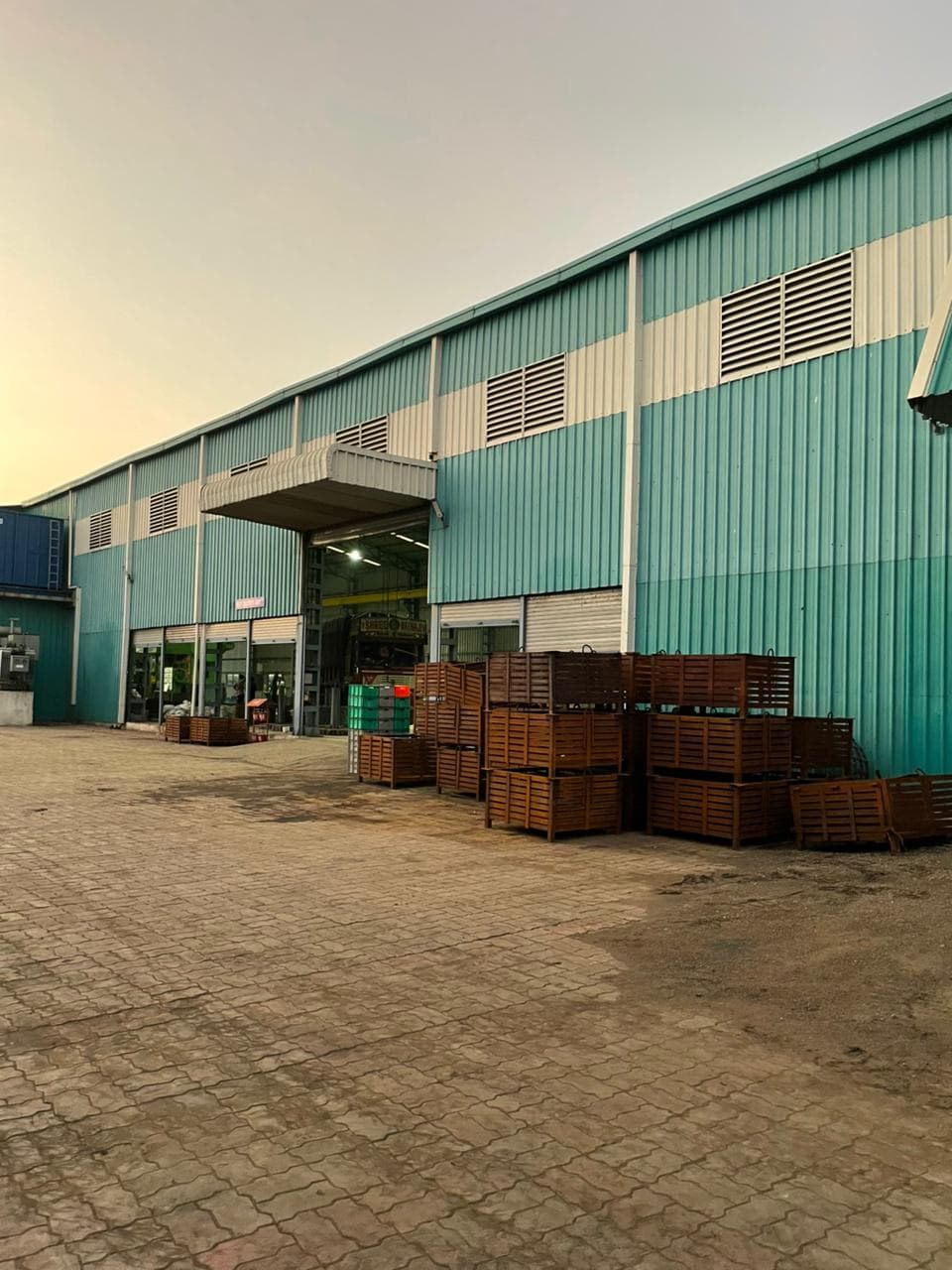 Forging and machining sections connected through central aisle.