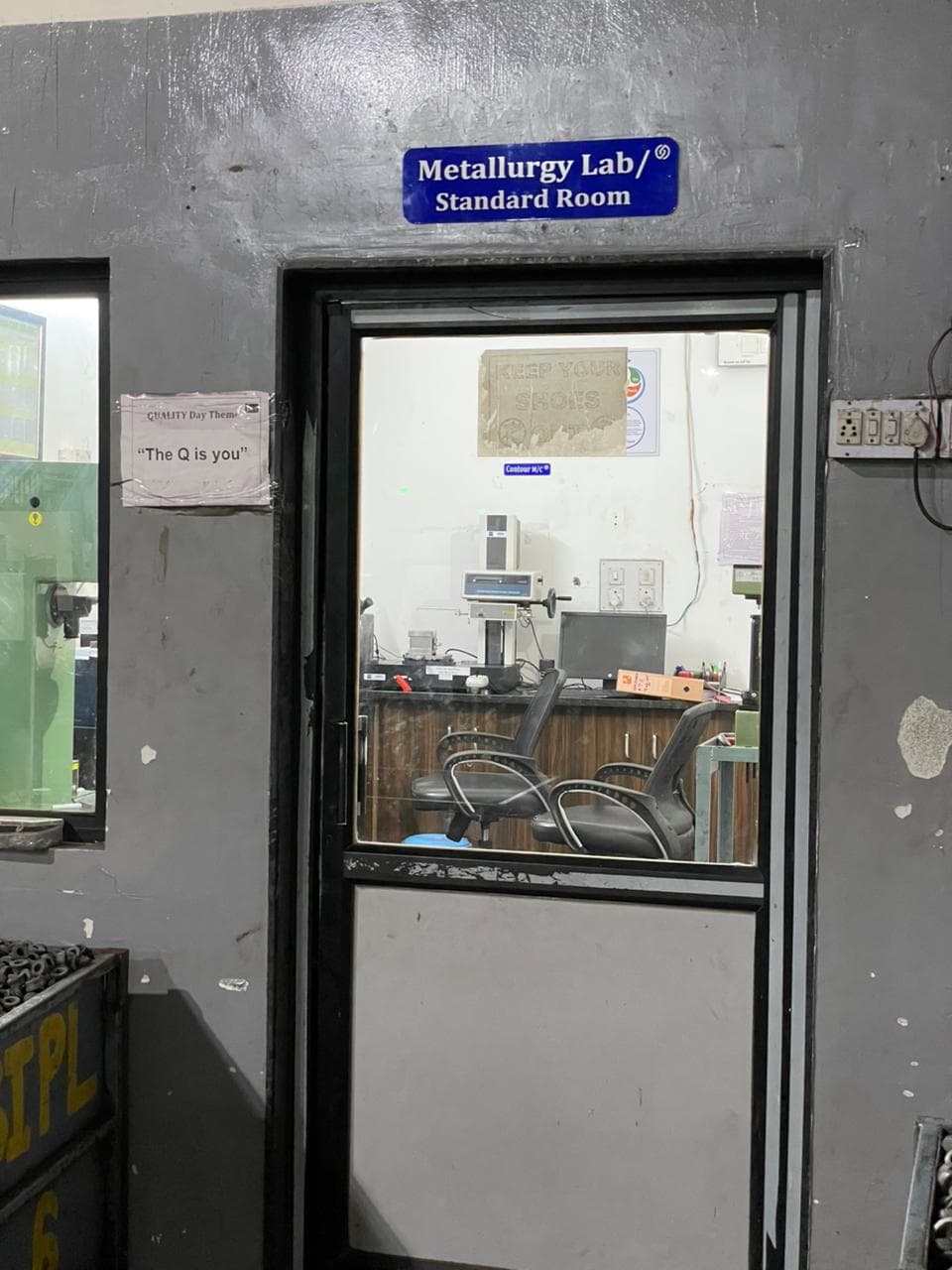 Shop floor logistics with forklifts and material trolleys.